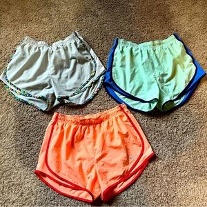 Three pairs women’s Nike dry fit shorts. Size L, excellent condition!